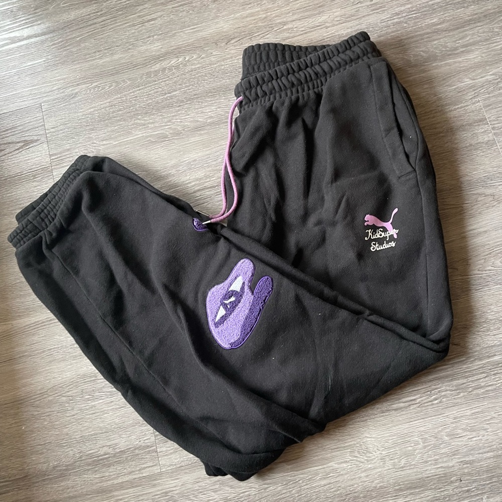 Puma x KidSuper Studios Sweatpants 530406-01 Joggers Black / Purple